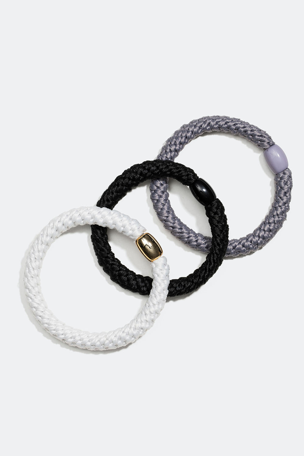 Flätade hårsnoddar i mix av svart, grått och vitt, 3-pack