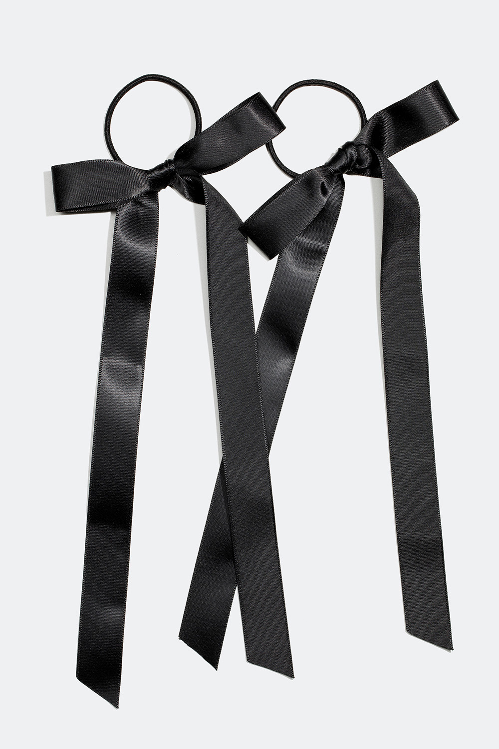 Hårsnoddar med svarta rosetter, 2-pack