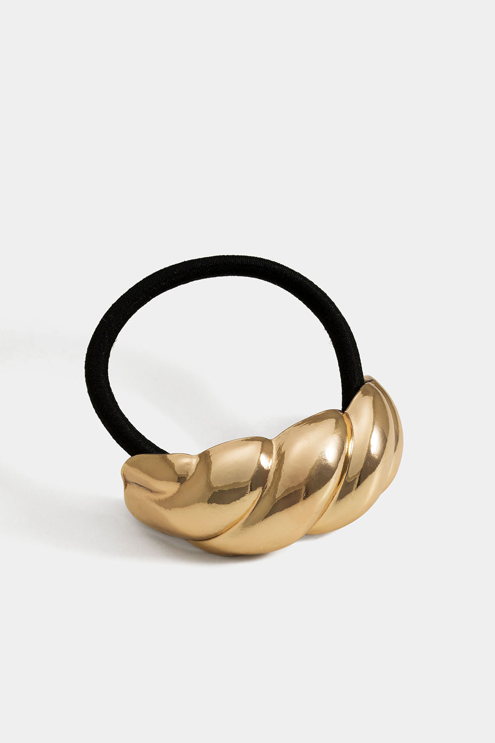 Hårsnodd med guldig tvinnad metall dekoration