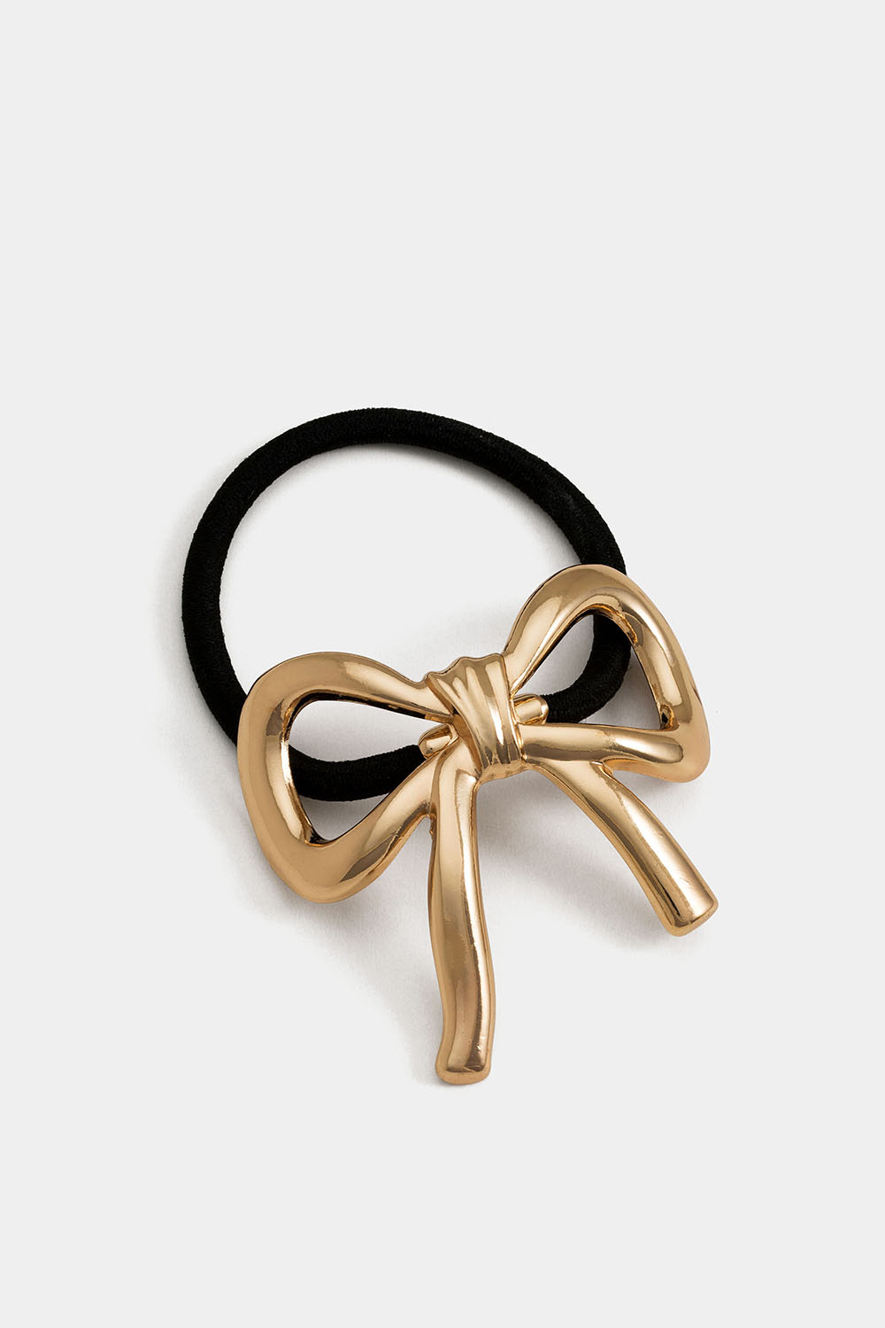 Hårsnodd med rosett i guldig metall