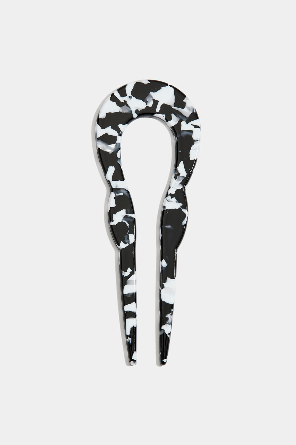 U-formad fransk hårnål, svart-vit