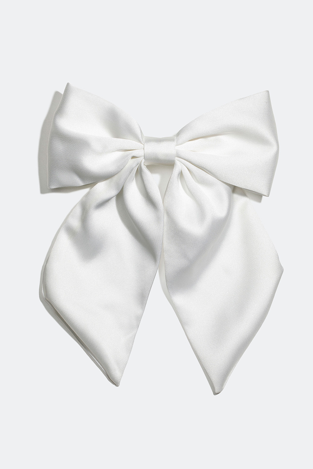 Hårspänne med rosett i vit sidenimitation