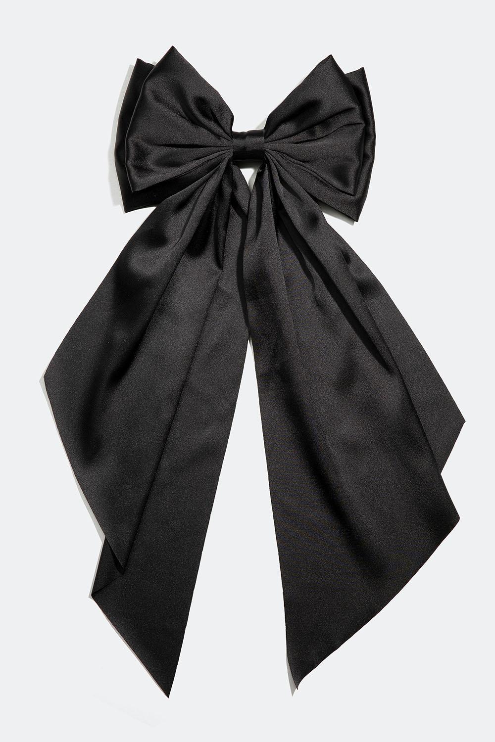 Hårspänne med stor svart rosett i sidenimitation