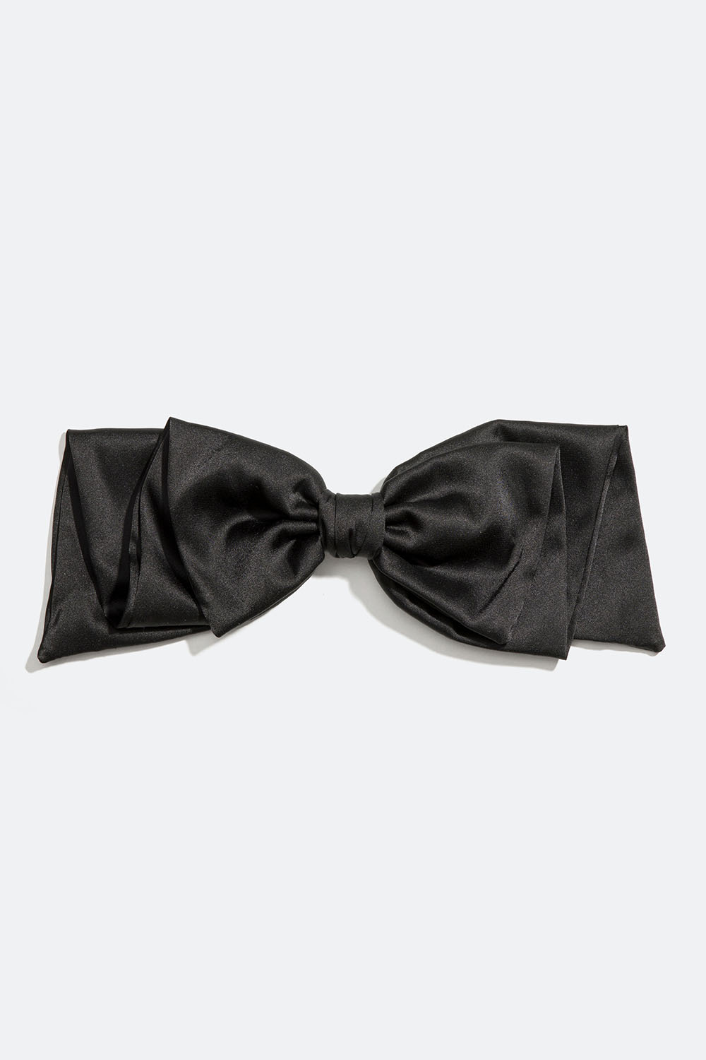 Hårspänne med stor rosett i svart sidenimitation