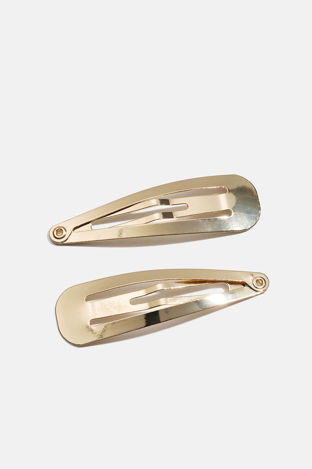 Små click-clack spännen i guld,  2-pack