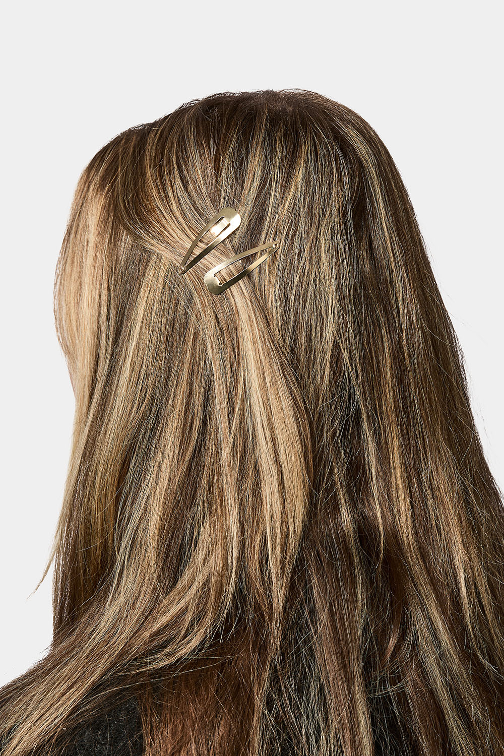 Små click-clack spännen i guld,  2-pack