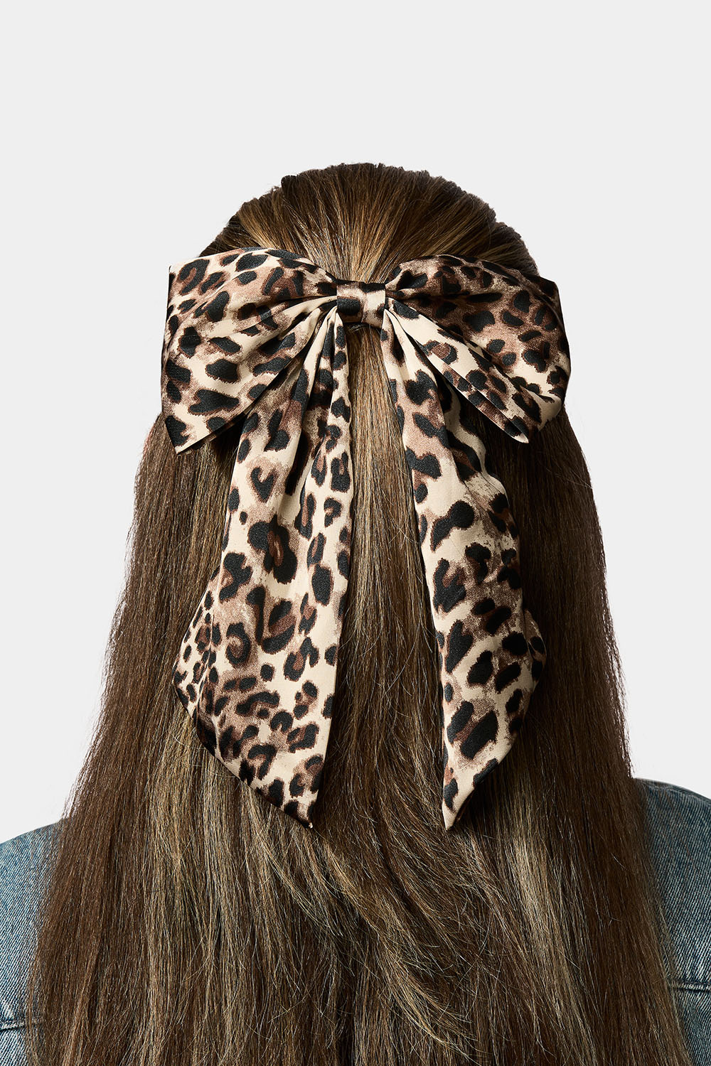 Hårspänne med stor leopardmönstrad rosett