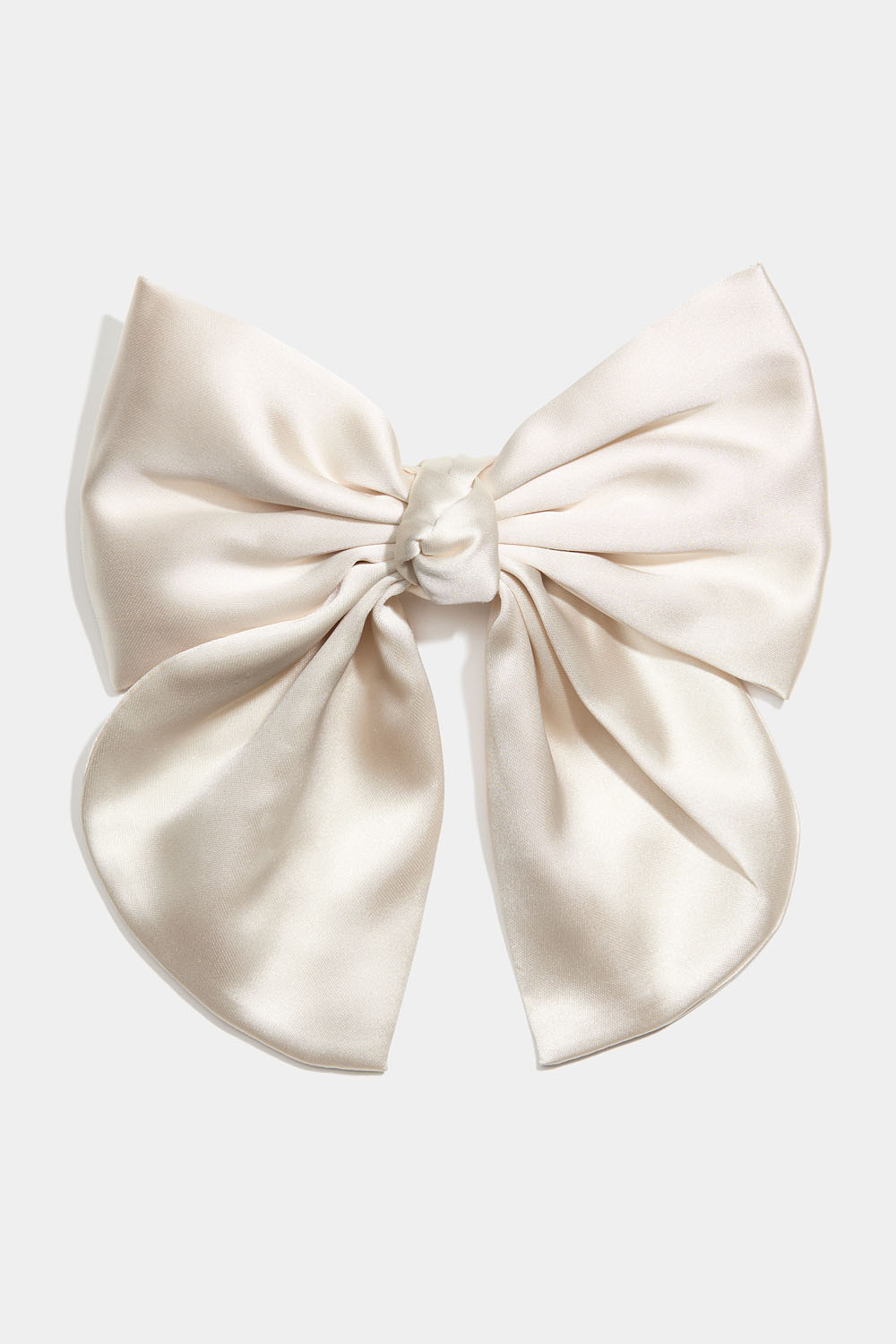 Hårspänne med beige rosett och knut