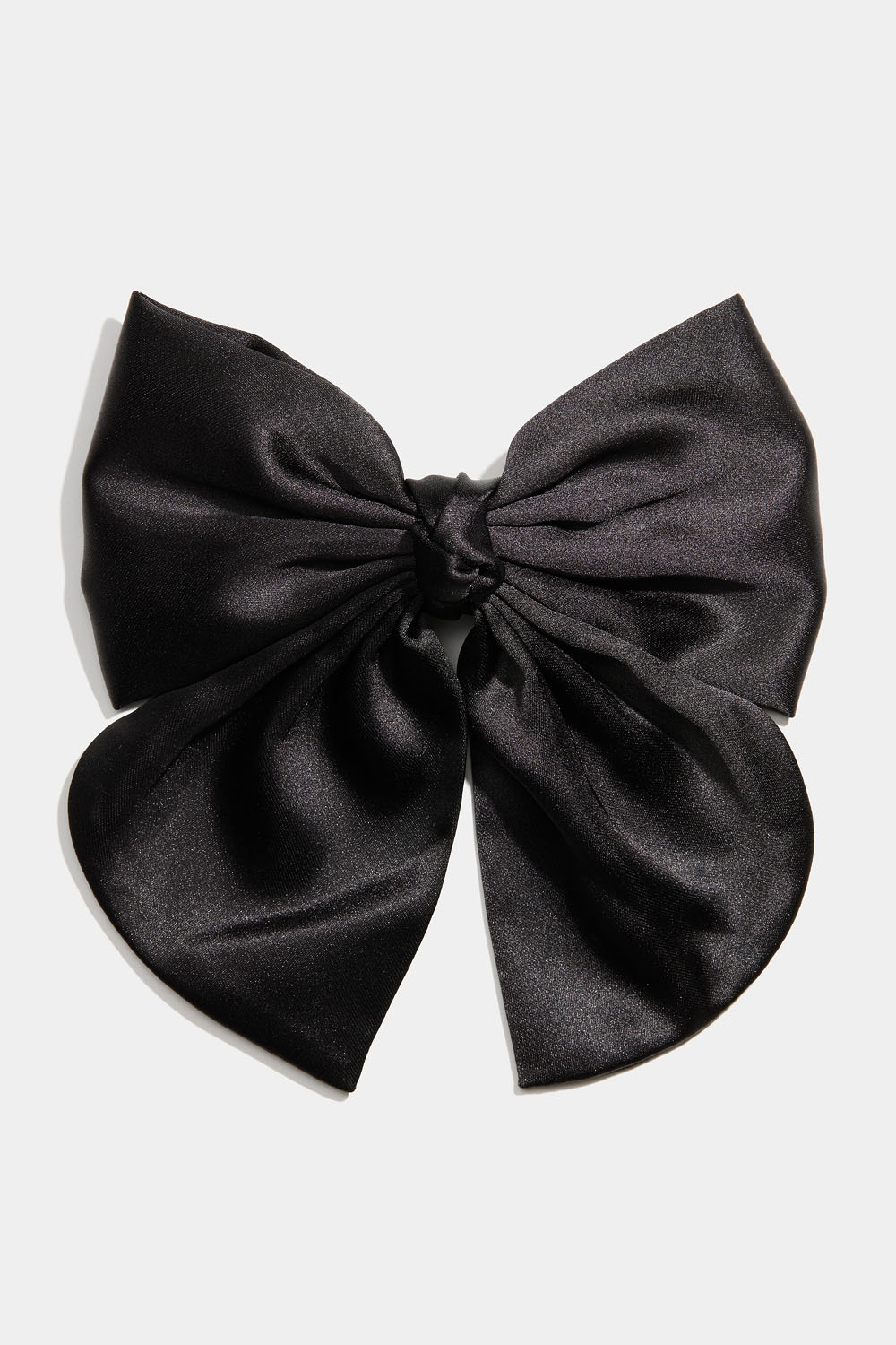 Hårspänne med svart rosett och knut