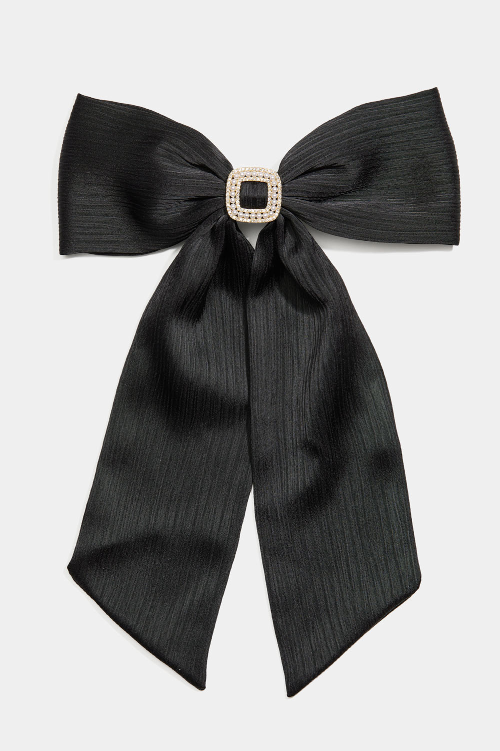 Hårspänne med svart rosett och strassdekoration