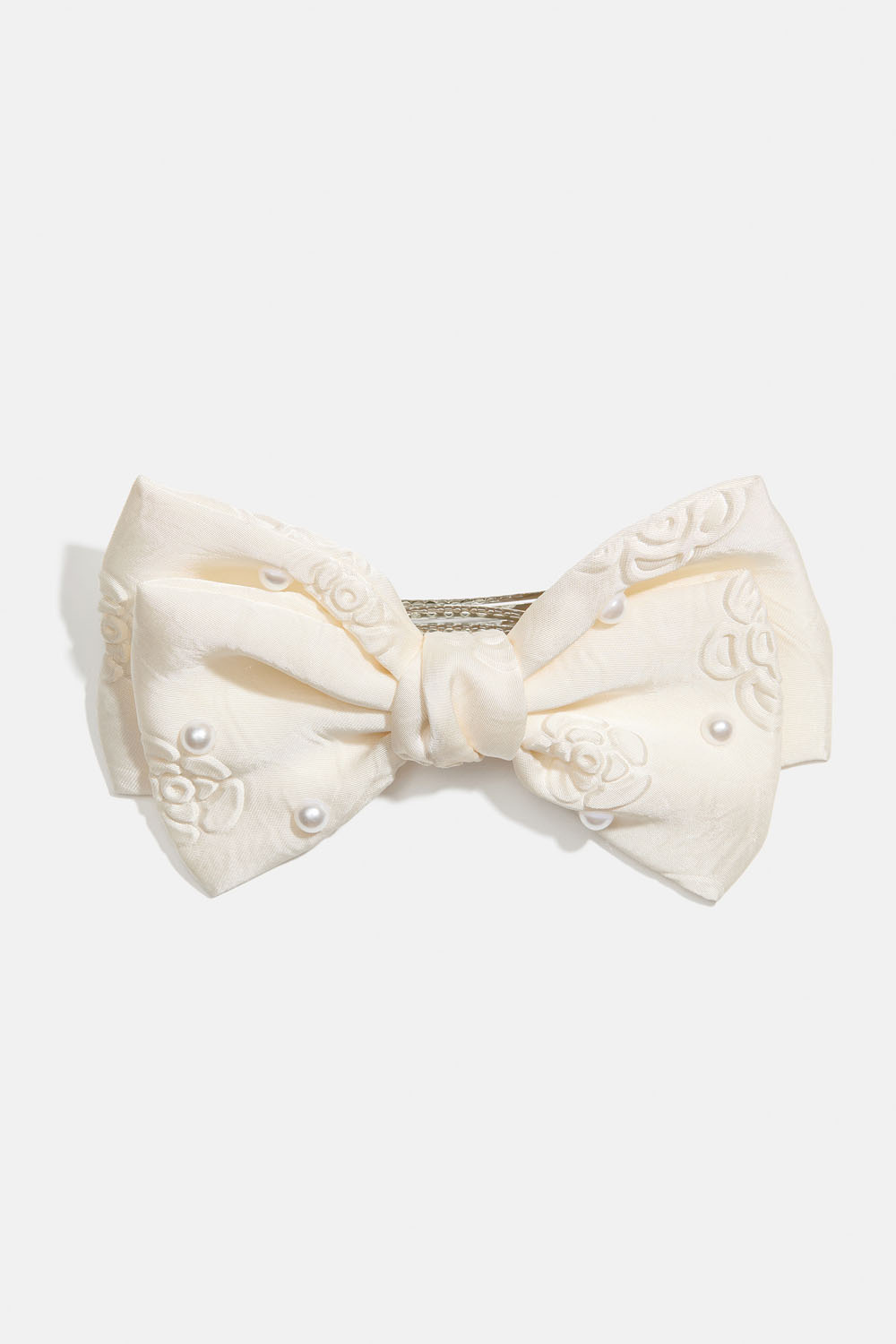 Hårspänne med vit rosett, pärlor och rosmönster