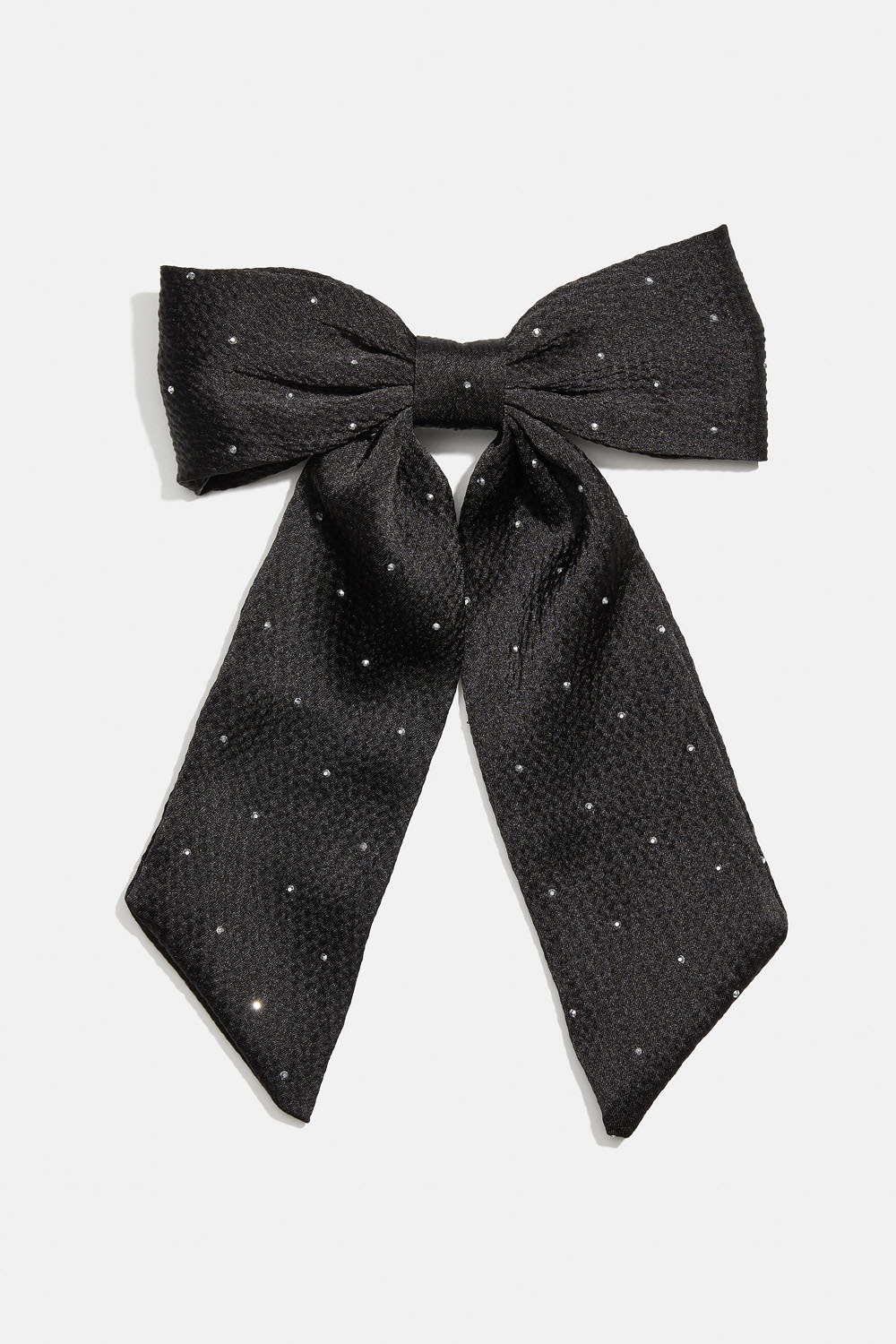 Hårspänne med svart rosett och små nitar