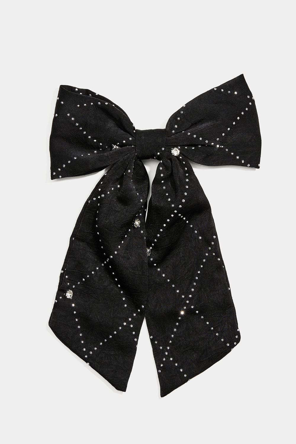 Hårspänne med svart rosett, små nitar och stenar