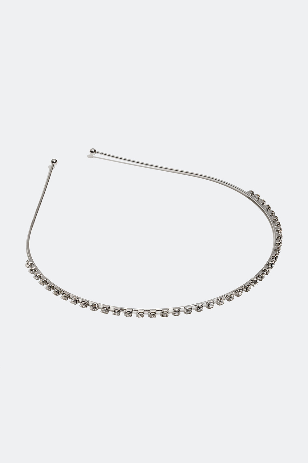 Silverfärgat diadem med glasstenar
