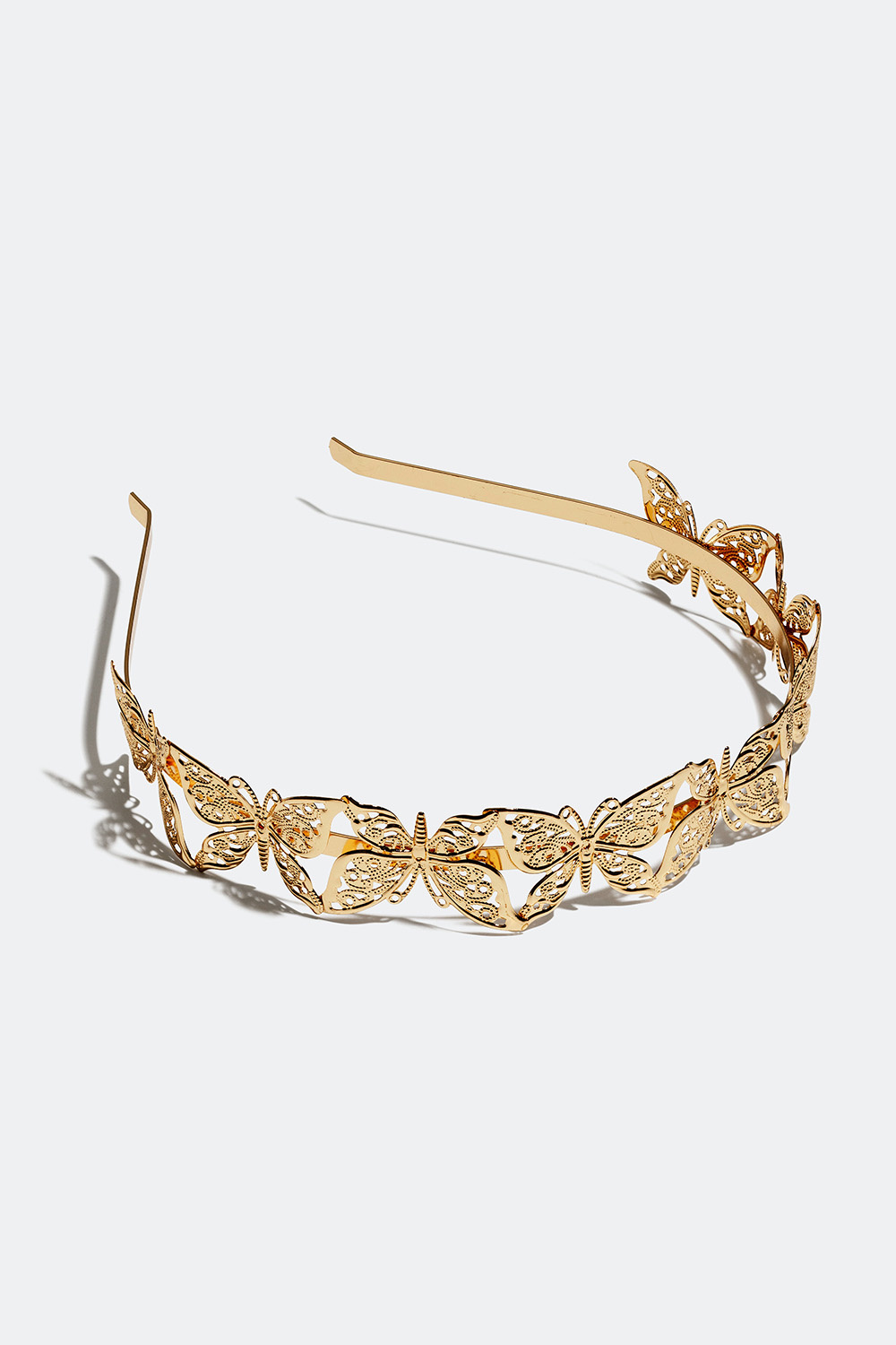 Guldfärgat diadem med fjärilar