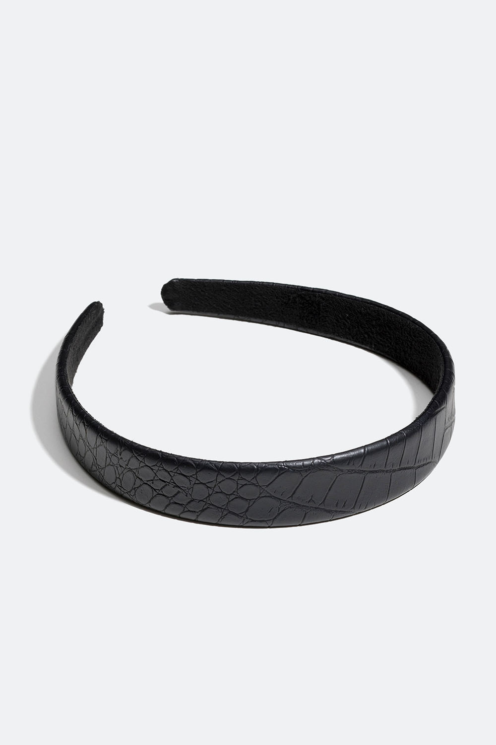 Svart krokodilmönstrat didem