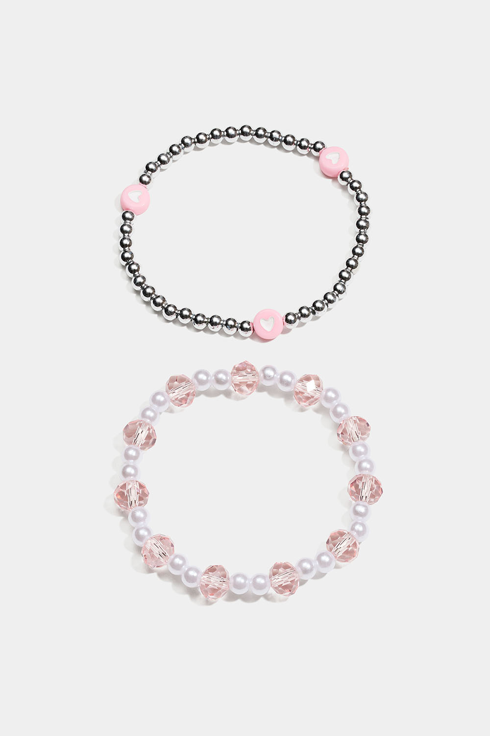 Elastiska armband med pärlor i rosa, vitt och silverfärg