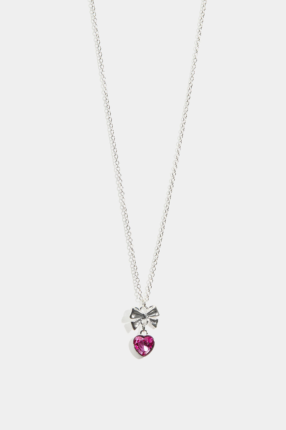 Halsband med rosett och rosa hjärta