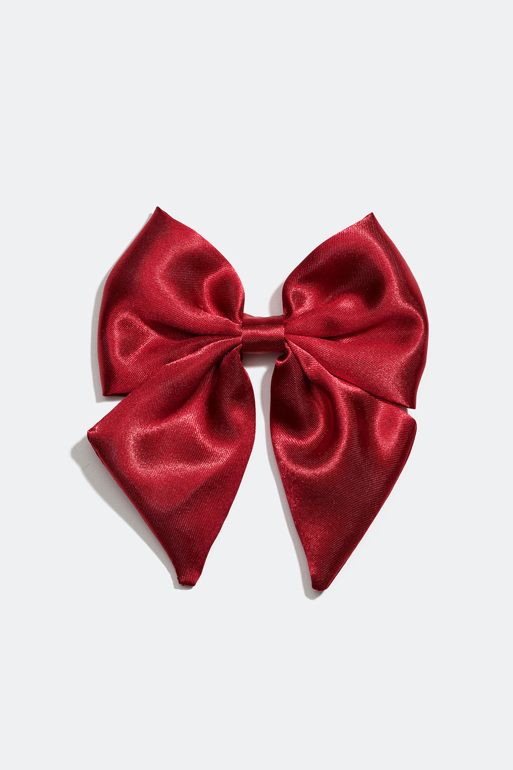 Hårspänne med liten rosett i röd sidenimitation