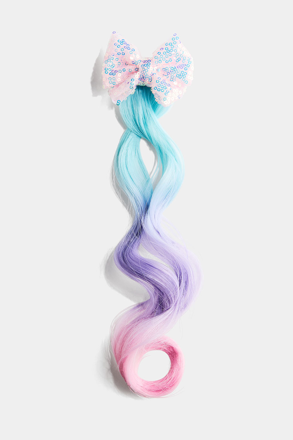 Färgglad löshårsklämma med rosett