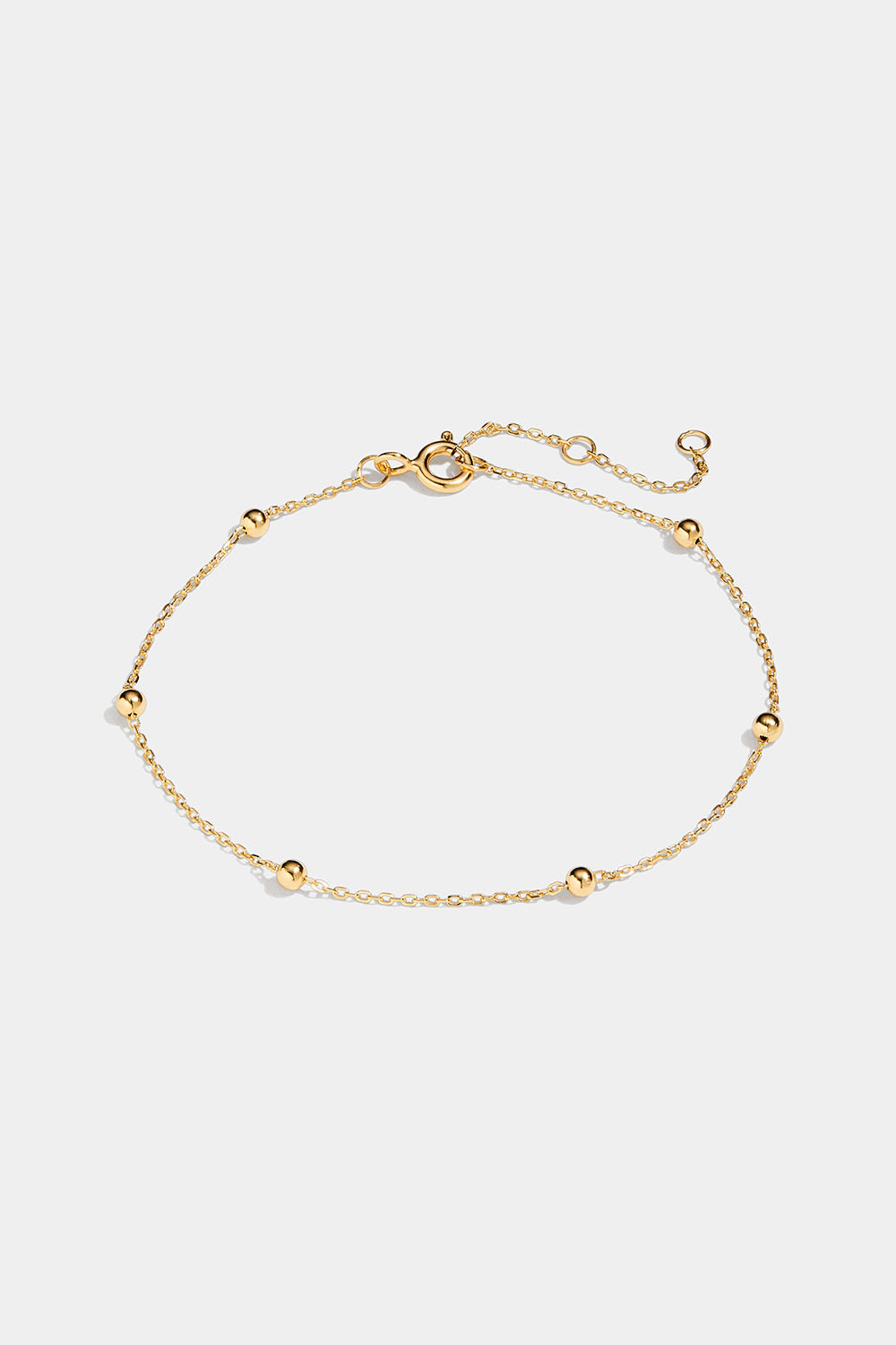 Tunt armband med små kulor i 18k guldpläterat silver.