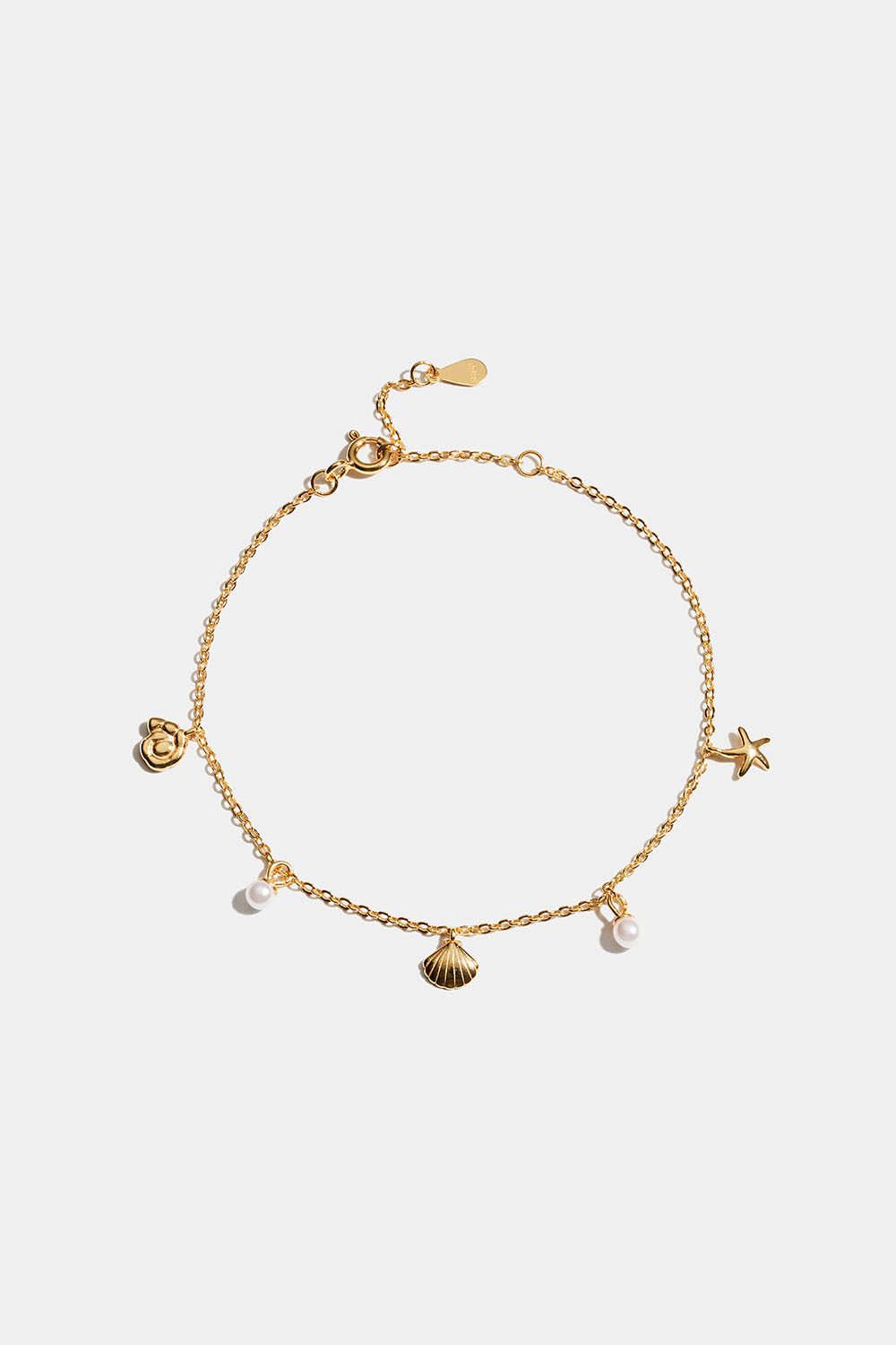 Armband i 18k guldpläterat äkta silver med berlocker från havet