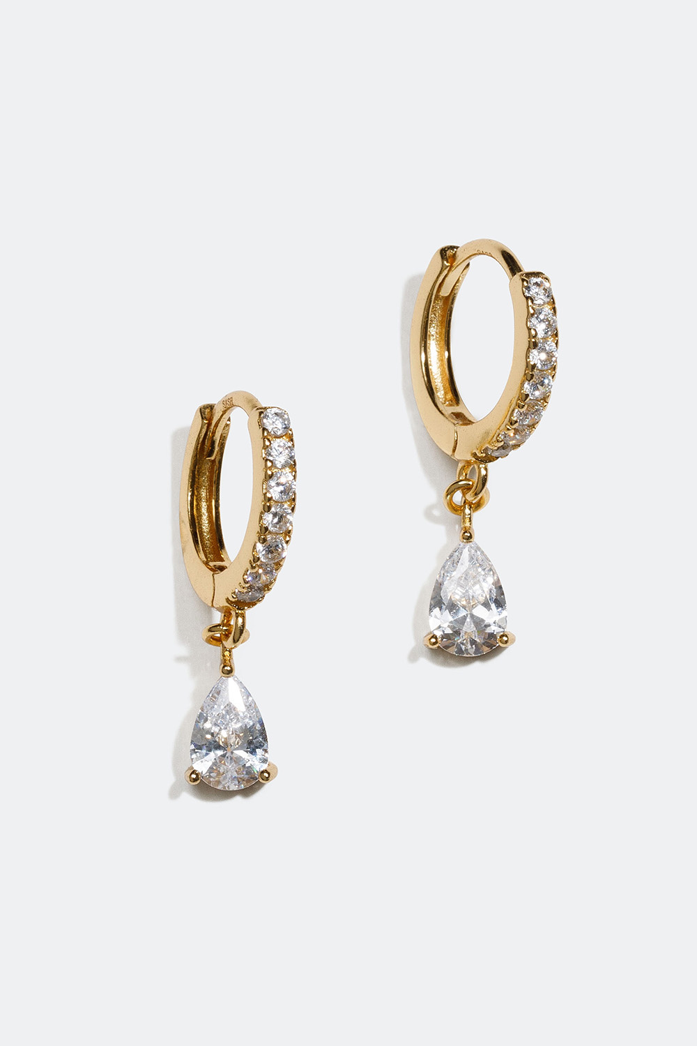 Mini hoops förgyllda med 18k guld och vita droppformade stenar