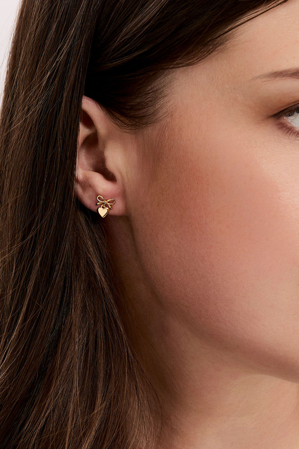 Örhängen i 18k guldpläterat äkta silver med rosett och hjärta