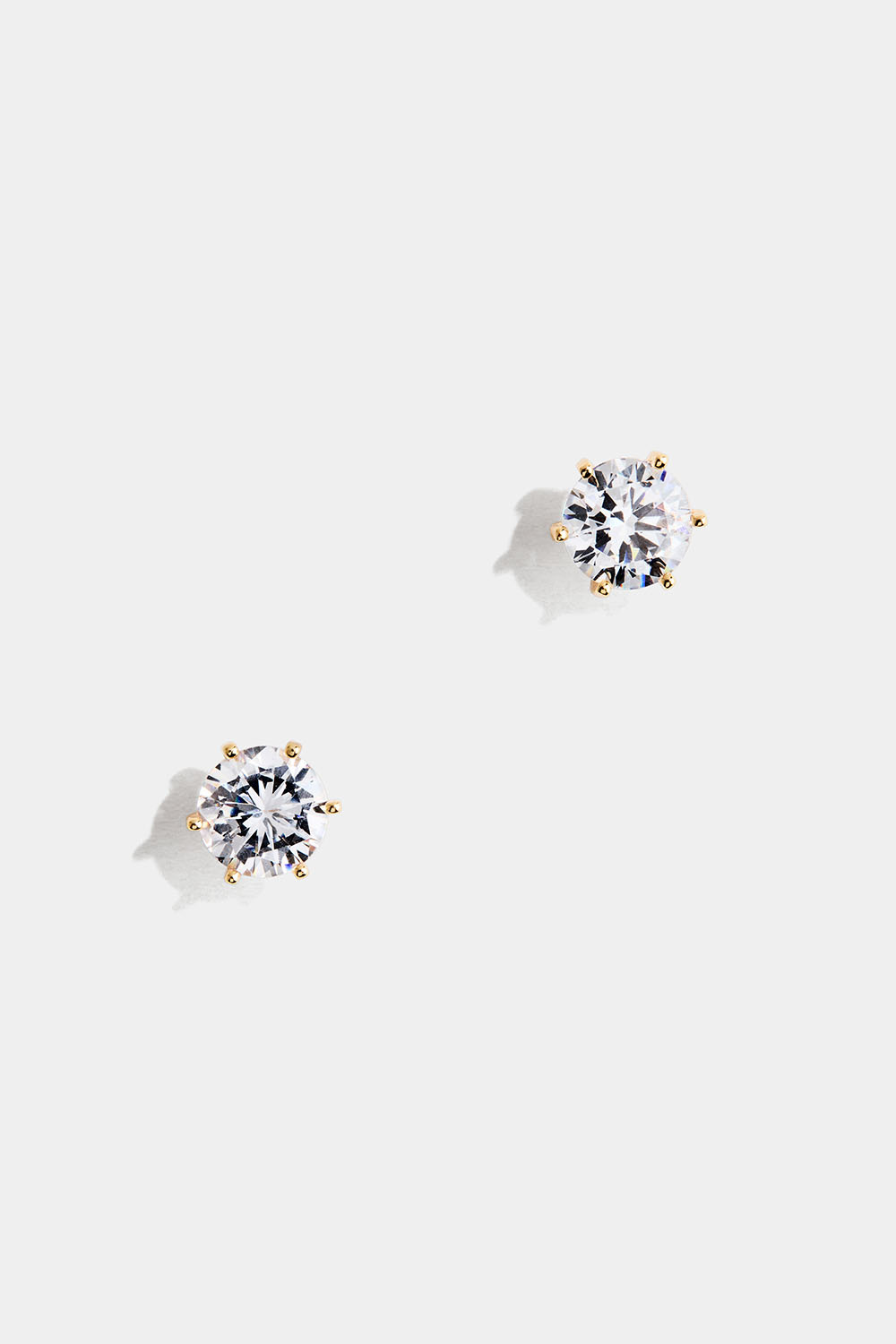 Studs i 18k guldpläterat äkta silver med rund Cubic Zirconia